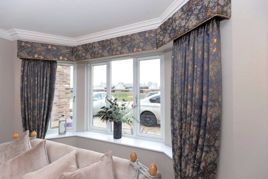 Shaped pelmets with full-length curtains
